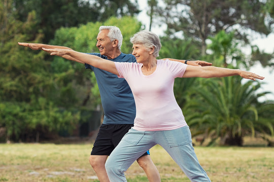 Older man and woman stretching 
