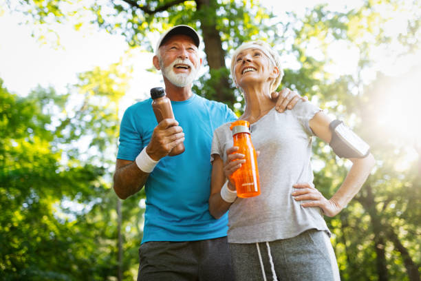 An older adult couple staying active in nature
