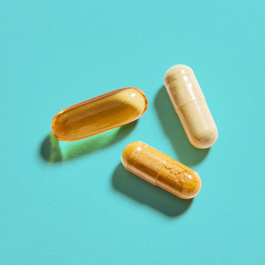 Three vitamins sitting side by side