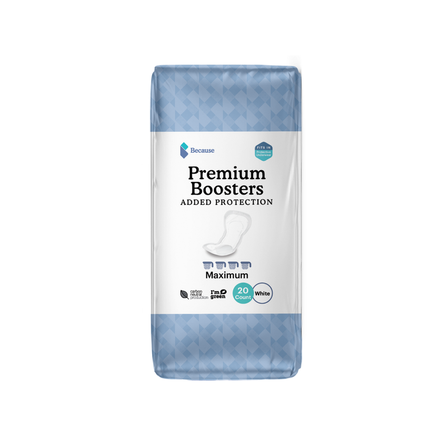 A blue rectangular package of Premium Boosters added protection maximum absorbency 20 count white. Fits in protective underwear./